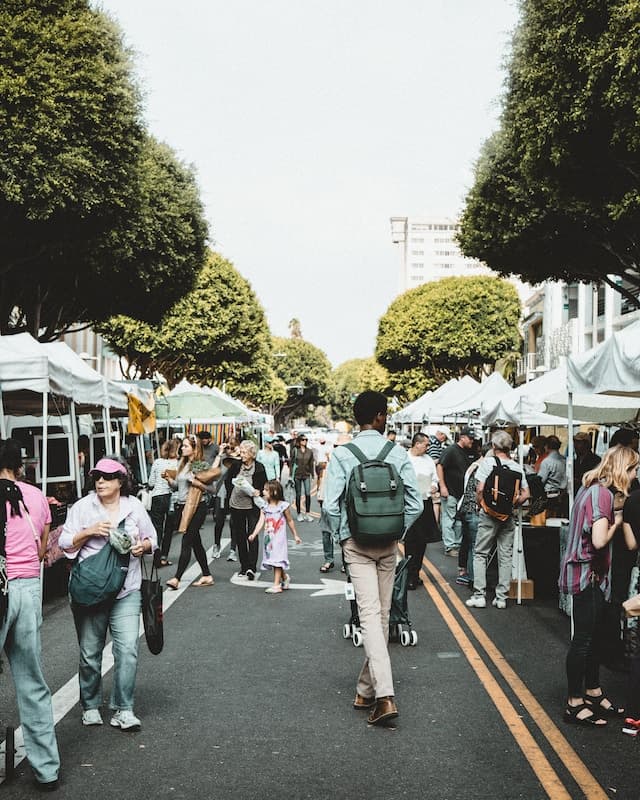 People walking in a farmers market